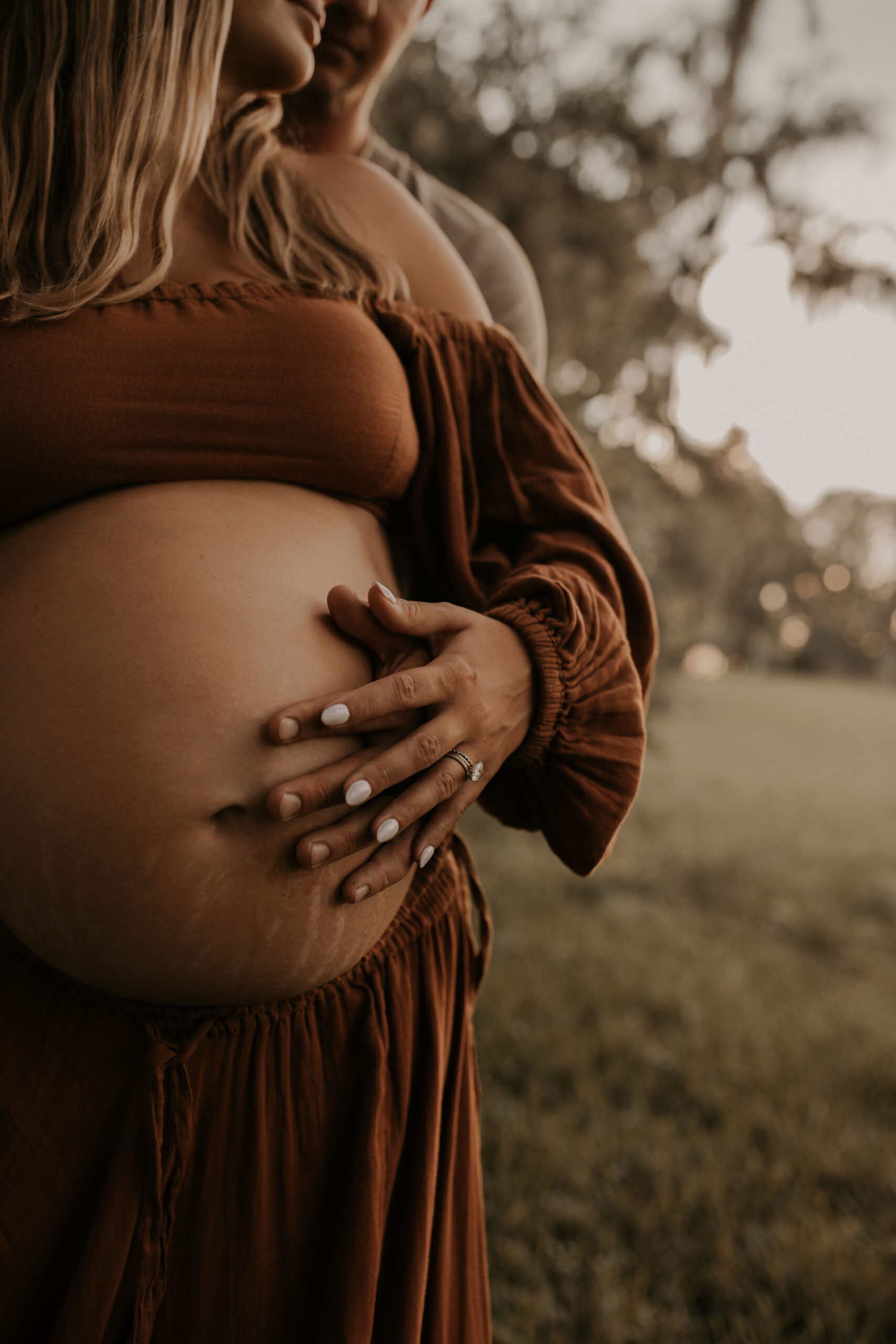 Expecting mother during an outdoor maternity photography session in Ocala Florida